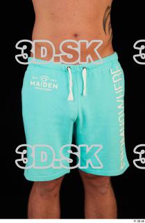 Leg turquoise shorts brown shoes of Leland 0001